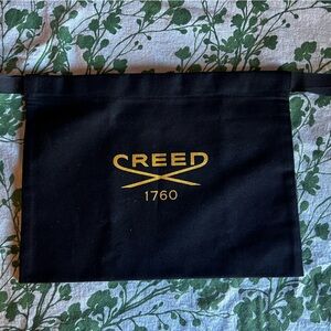 Creed Black Bag with Gold Logo